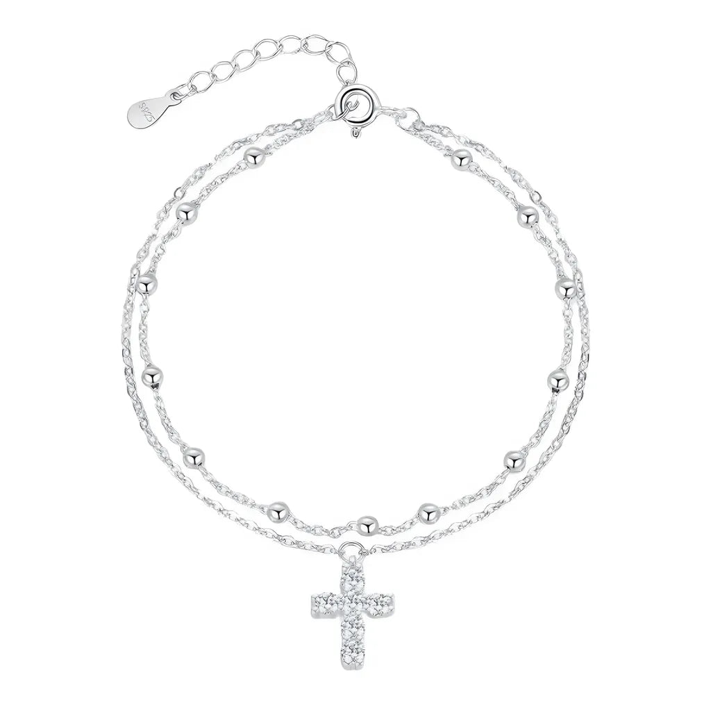 pulseira-de-prata-cruz-com-zirconias-no-fundo-branco