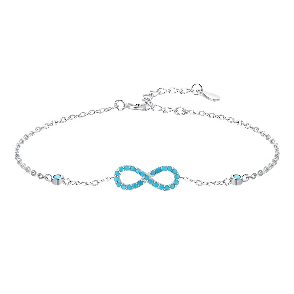 pulseira-de-prata-infinity-com-turquesa-no-fundo-branco