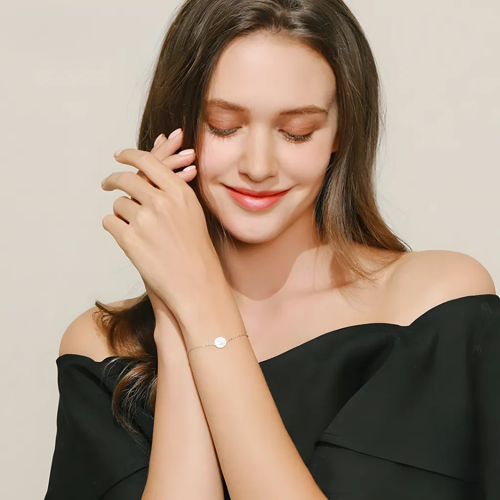 pulseira-de-prata-justine-com-zirconias-foto-sendo-usado-no-braco-esquerdo