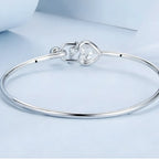 pulseira-de-prata-lock-banhado-em-ouro-branco-com-zirconias-de-tras