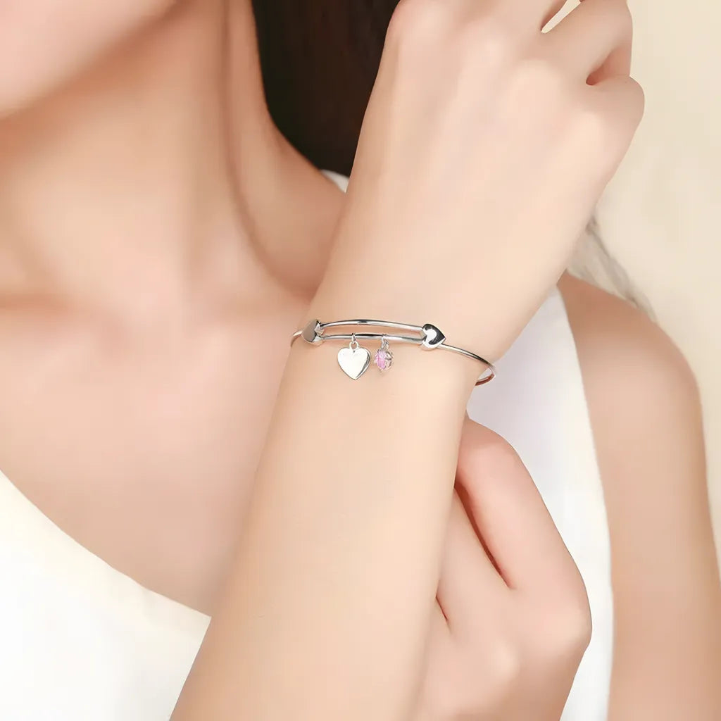 pulseira-de-prata-love-com-zirconia-foto-sendo-utilizado-no-braco